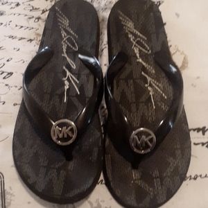 Micheal Kors flip flops